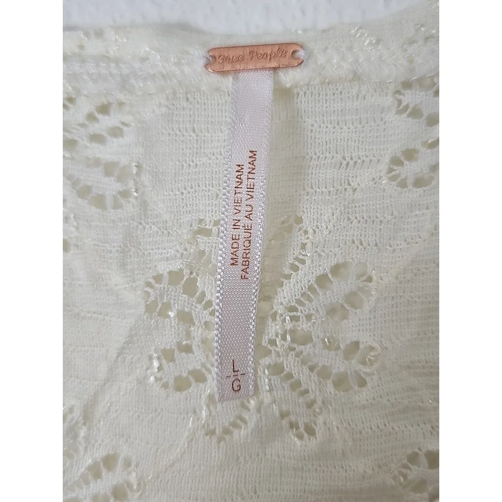 FREE PEOPLE IVORY Daisy Eyelet Lace Godet‎ Peplum Top Size Large